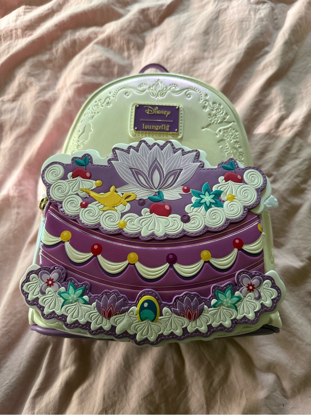 Loungefly Disney’s Princess Jasmine Floral Cake Mini Backpack